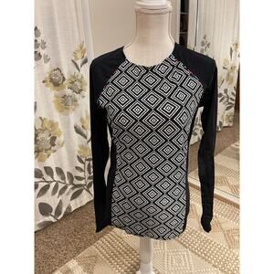 Title 9 Women’s Rash Guard Size L
Black White Geometrical Like New Form Fitting